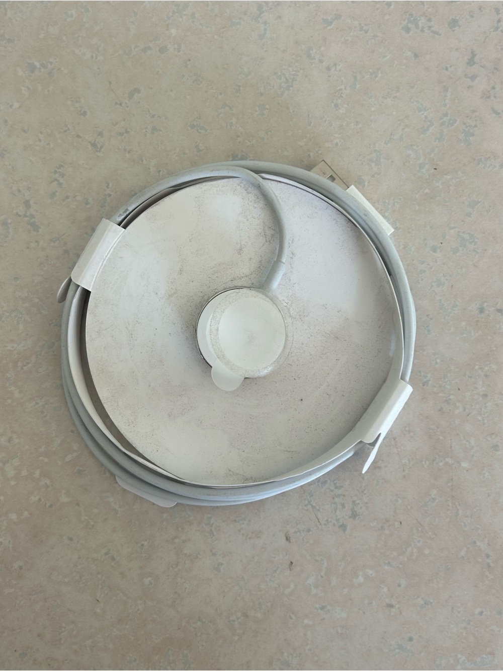 Round Apple Watch charger White